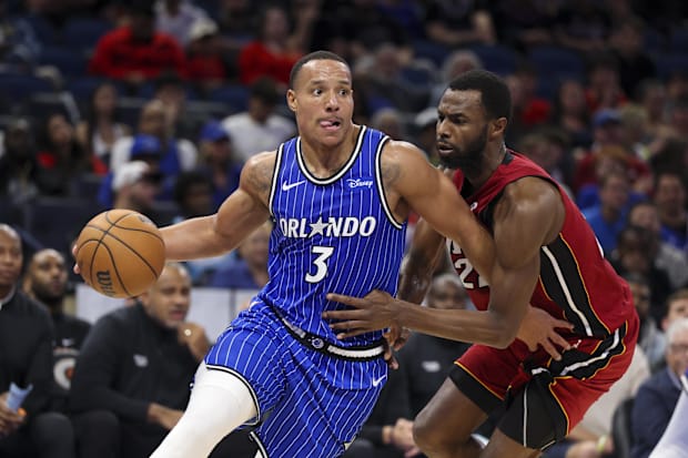 Magic guard Desmond Bane drives to the basket past Heat forward Andrew Wiggins.