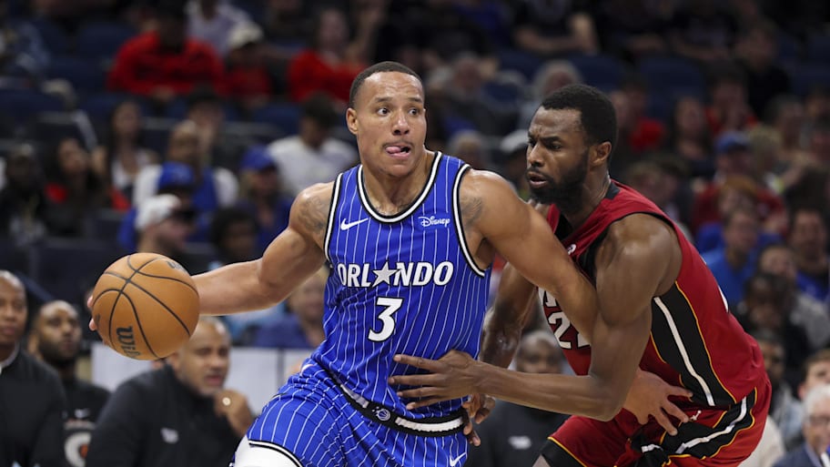 Magic guard Desmond Bane drives to the basket past Heat forward Andrew Wiggins.