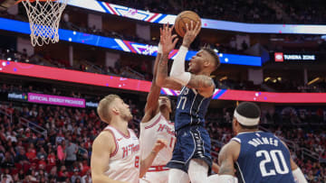 Dec 22, 2023; Houston, Texas, USA; Dallas Mavericks guard Dexter Dennis (17) shoots against Houston Rockets forward Amen Thompson (1) in the second half at Toyota Center. Mandatory Credit: Thomas Shea-USA TODAY Sports