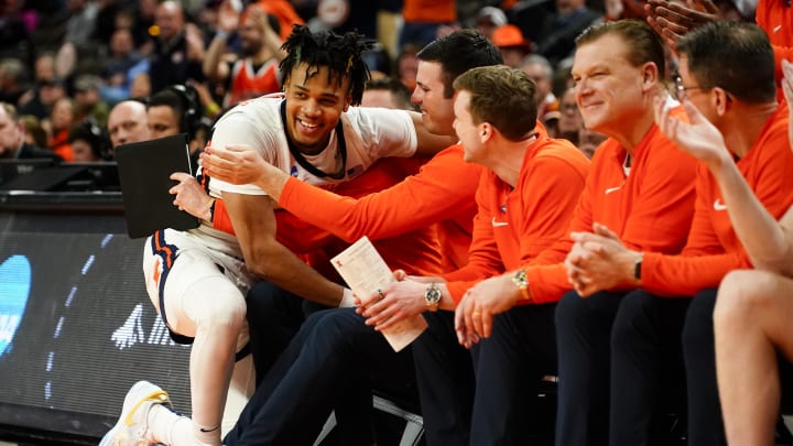 Mar 23, 2024; Omaha, NE, USA; Illinois Fighting Illini guard Terrence Shannon Jr. (0) smiles on the sidelines against the Duquesne Dukes during the second half in the second round of the 2024 NCAA Tournament at CHI Health Center Omaha. Mandatory Credit: Dylan Widger-USA TODAY Sports
