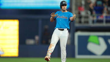 Aug 24, 2025; Miami, Florida, USA; Miami Marlins center fielder Jakob Marsee (87) reacts from second base after hitting a double against the Toronto Blue Jays during the seventh inning at loanDepot Park.