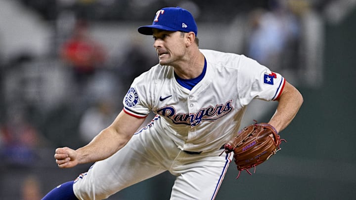 Sep 5, 2024; Arlington, Texas, USA; Texas Rangers relief pitcher David Robertson (37) pitches against the Los Angeles Angels during the game at Globe Life Field. Mandatory Credit: Jerome Miron-Imagn Images