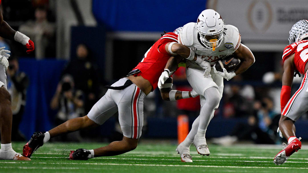 Jan 10, 2025; Arlington, TX, USA; Texas Longhorns running back Jaydon Blue (23) in action during the game between the Texas Longhorns and the Ohio State Buckeyes at AT&T Stadium. Mandatory Credit: Jerome Miron-Imagn Images Jan 10, 2025; Arlington, TX, USA; Texas Longhorns running back Jaydon Blue (23) in action during the game between the Texas Longhorns and the Ohio State Buckeyes at AT&T Stadium. Mandatory Credit: Jerome Miron-Imagn Images
