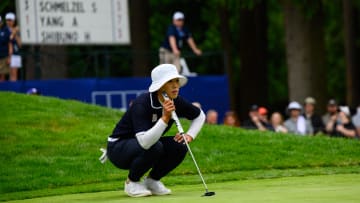 Jun 22, 2024; Sammamish, Washington, USA; Amy Yang lines up for a putt on hole eighteen during the third round of the KPMG Women's PGA Championship golf tournament. Mandatory Credit: Steven Bisig-USA TODAY Sports