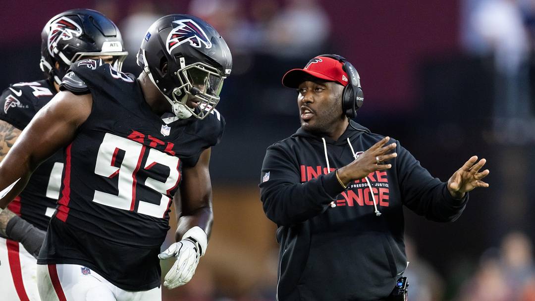 Dec 21, 2025; Glendale, Arizona, USA; Atlanta Falcons defensive lineman Kentavius Street (93) with special teams coordinator Marquice Williams against the Arizona Cardinals at State Farm Stadium. Mandatory Credit: Mark J. Rebilas-Imagn Images