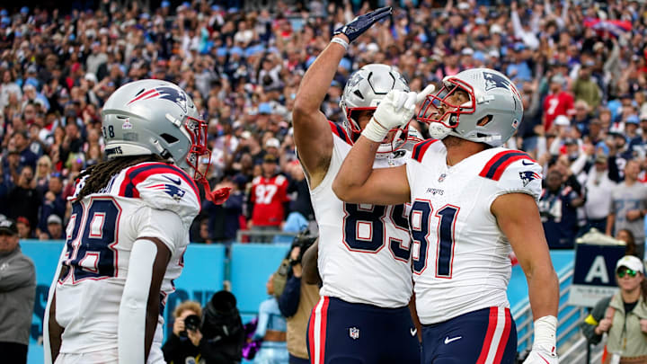 New England Patriots tight end Austin Hooper (81) celebrates his touchdown during the second quarter against the Tennessee Titans at Nissan Stadium in Nashville, Tenn., Sunday, Oct. 19, 2025.
