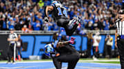 Detroit Lions running back Jahmyr Gibbs celebrates a touchdown against the Tampa Bay Buccaneers with wide receiver Amon-Ra St. Brown during the first half at Ford Field in Detroit on Monday, Oct. 20, 2025.