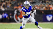 Aug 22, 2024; Cincinnati, Ohio, USA; Indianapolis Colts running back Zavier Scott (34) runs with the ball against the Cincinnati Bengals in the second half at Paycor Stadium.