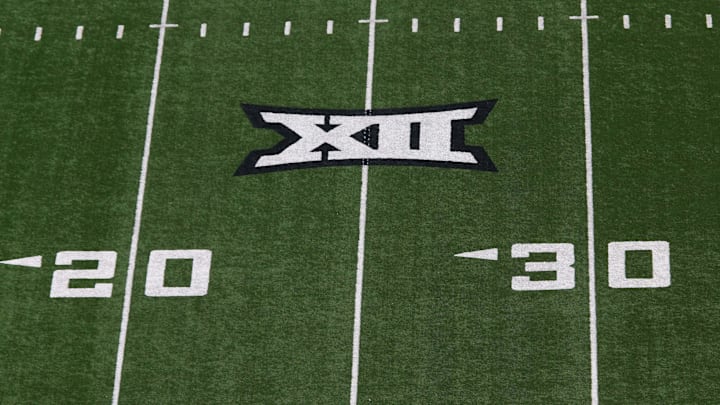 Oct 22, 2022; Lubbock, Texas, USA; A general view of the Big 12 Logo on the field before the game between the West Virginia Mountaineers and the Texas Tech Red Raiders at Jones AT&T Stadium and Cody Campbell Field. Mandatory Credit: Michael C. Johnson-Imagn Images Oct 22, 2022; Lubbock, Texas, USA; A general view of the Big 12 Logo on the field before the game between the West Virginia Mountaineers and the Texas Tech Red Raiders at Jones AT&T Stadium and Cody Campbell Field. Mandatory Credit: Michael C. Johnson-Imagn Images
