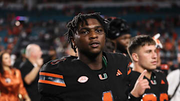 Oct 26, 2024; Miami Gardens, Florida, USA; Miami Hurricanes quarterback Cam Ward (1) looks on after the game against the Florida State Seminoles at Hard Rock Stadium. Mandatory Credit: Sam Navarro-Imagn Images