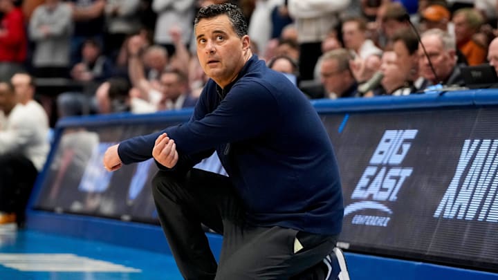 Xavier coach Sean Miller watch his team play against Texas during their game in the First Four of the NCAA men's tournament at University of Dayton Arena.