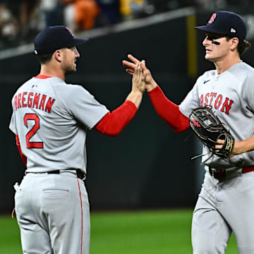 Aug 27, 2025; Baltimore, Maryland, USA; Boston Red Sox third baseman Alex Bregman (2) celebrates the win against the Baltimore Orioles with outfielder Roman Anthony (19)  at Oriole Park at Camden Yards. Mandatory Credit: James A. Pittman-Imagn Images