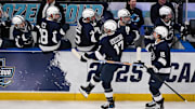 The Penn State Nittany Lions celebrate a goal in an NCAA Frozen Four game against the Boston University Terriers.