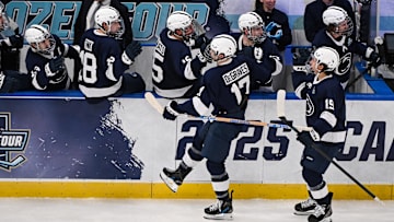 Penn State Nittany Lions men's hockey team celebrating goal