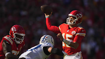 Nov 23, 2025; Kansas City, Missouri, USA; Kansas City Chiefs quarterback Patrick Mahomes (15) throws a pass against Indianapolis Colts defensive end Laiatu Latu (97) in the first half at GEHA Field at Arrowhead Stadium. Mandatory Credit: Jay Biggerstaff-Imagn Images