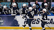 Penn State Nittany Lions forward Nicholas DeGraves (17) celebrates with teammates after scoring a goal against the Boston University Terriers during their Frozen Four game at Enterprise Center in St. Louis. 
