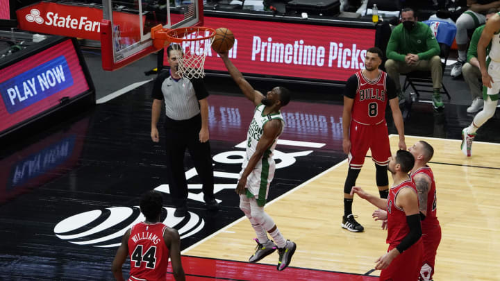May 7, 2021; Chicago, Illinois, USA; Boston Celtics guard Kemba Walker (8) scores against the Chicago Bulls during the second half at United Center. Mandatory Credit: David Banks-USA TODAY Sports