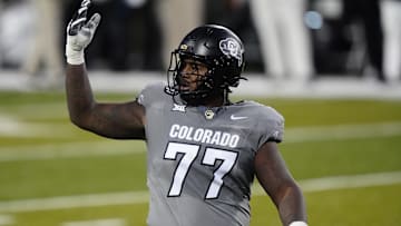 Nov 1, 2025; Boulder, Colorado, USA; Colorado Buffaloes offensive lineman Jordan Seaton (77) reacts to a penalty called during the second quarter against the Arizona Wildcats at Folsom Field. Mandatory Credit: Ron Chenoy-Imagn Images