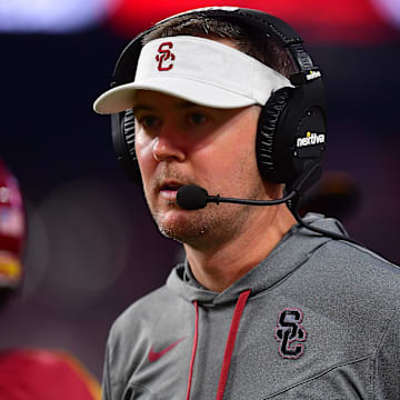 Dec 2, 2022; Las Vegas, NV, USA; Southern California Trojans head coach Lincoln Riley watches game action against the Utah Utes during the second half in the PAC-12 Football Championship at Allegiant Stadium. Mandatory Credit: Gary A. Vasquez-Imagn Images