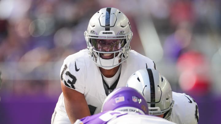 Aug 10, 2024; Minneapolis, Minnesota, USA; Las Vegas Raiders quarterback Anthony Brown Jr. (13) under center against the Minnesota Vikings in the fourth quarter at U.S. Bank Stadium.