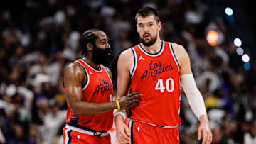 Los Angeles Clippers guard James Harden (1) and center Ivica Zubac (40) at Ball Arena.