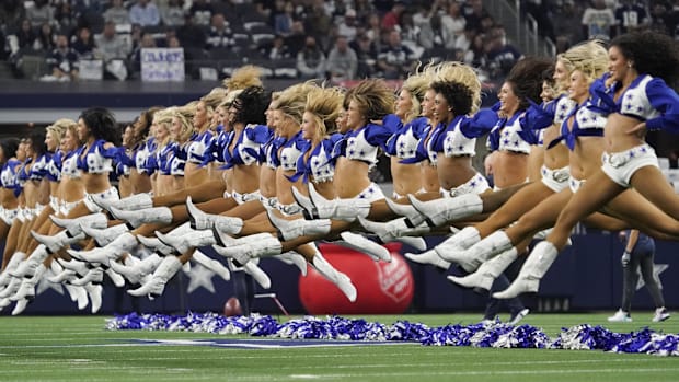 Dallas Cowboys cheerleaders perform prior to a game between the Dallas Cowboys and the Houston Texans.