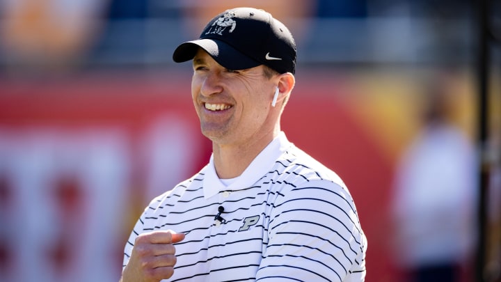 Purdue Boilermakers assistant coach Drew Brees smiles 