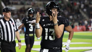Oct 26, 2024; Honolulu, Hawaii, USA; Hawaii Rainbow Warriors quarterback Brayden Schager (13) reacts after making his fourth touchdown of the game during the fourth quarter of a game against the Nevada Wolfpack at the Clarence T.C. Ching Athletics Complex.