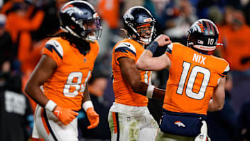 Dec 15, 2024; Denver, Colorado, USA; Denver Broncos wide receiver Courtland Sutton (14) celebrates with quarterback Bo Nix (10) after a touchdown ahead of wide receiver Lil'Jordan Humphrey (84) in the fourth quarter against the Indianapolis Colts at Empower Field at Mile High. Mandatory Credit: Isaiah J. Downing-Imagn Images