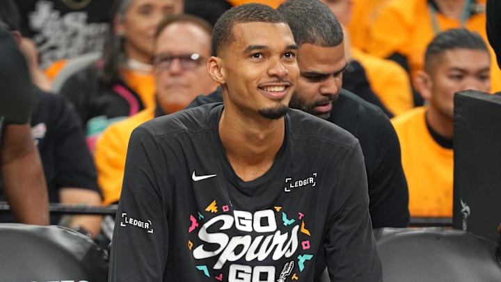 Apr 19, 2026; San Antonio, Texas, USA; San Antonio Spurs forward Victor Wembanyama (1) sits on the bench before game one of the first round of the 2026 NBA Playoffs against the Portland Trail Blazers at Frost Bank Center. Mandatory Credit: Scott Wachter-Imagn Images