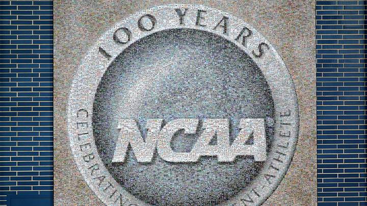 Feb 26, 2026; Indianapolis, IN, USA; A NCAA 100 years anniversary logo at the Hall of Champions at the NCAA National Office. Mandatory Credit: Kirby Lee-Imagn Images