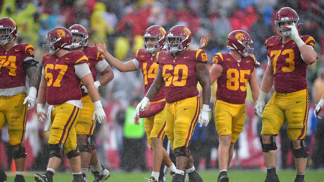 Nov 15, 2025; Los Angeles, California, USA; Southern California Trojans quarterback Jayden Maiava (14) celebrates the victory against the Iowa Hawkeyes at the Los Angeles Memorial Coliseum. Mandatory Credit: Gary A. Vasquez-Imagn Images