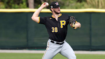 Pittsburgh Pirates pitcher Paul Skenes (30) throws the ball during spring training workouts at Pirate City. 