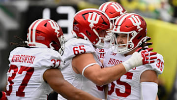Oct 11, 2025; Eugene, Oregon, USA; Indiana Hoosiers placekicker Brendan Franke (35) celebrates with offensive lineman Carter Smith (65) and tight end Riley Nowakowski (37) after kicking a 58-yard field goal against the Oregon Ducks during the second quarter at Autzen Stadium. Mandatory Credit: Troy Wayrynen-Imagn Images