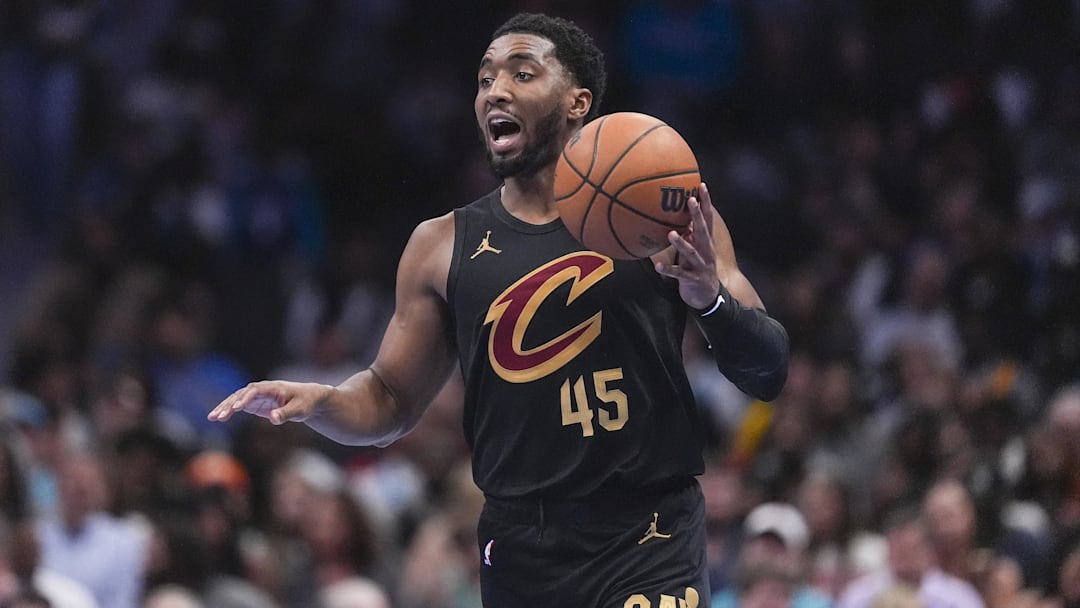 Feb 20, 2026; Charlotte, North Carolina, USA; Cleveland Cavaliers guard Donovan Mitchell (45) dribbles against the Charlotte Hornets during the second half at the Spectrum Center. Mandatory Credit: Jim Dedmon-Imagn Images