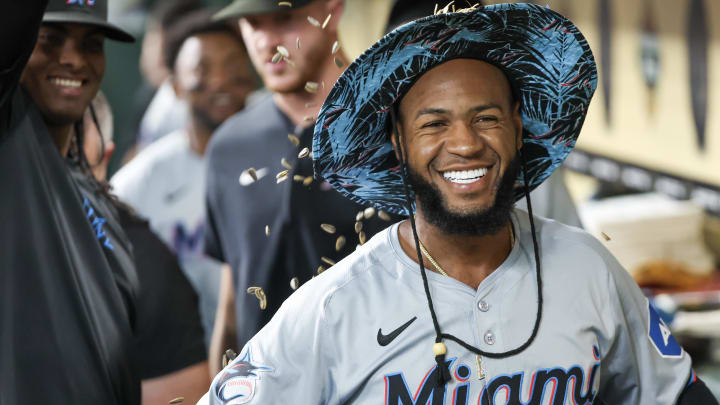 Jul 11, 2024; Houston, Texas, USA; Miami Marlins left fielder Bryan De La Cruz (14) celebrates his home run with teammates against the Houston Astros in the first inning at Minute Maid Park.