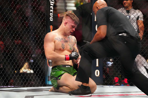 Jimmy Crute reacts after being defeated by Alonzo Menifield during UFC 290 at T-Mobile Arena.