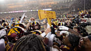 Nov 29, 2025; Minneapolis, Minnesota, USA; Minnesota Golden Gophers celebrate with Paul Bunyan’s Axe after the game against the Wisconsin Badgers at Huntington Bank Stadium. Mandatory Credit: Matt Krohn-Imagn Images