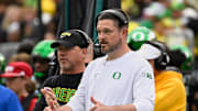 Oct 11, 2025; Eugene, Oregon, USA; Oregon Ducks head coach Dan Lanning instructs his team from the sideline against the Indiana Hoosiers during the third quarter at Autzen Stadium. 
