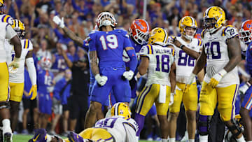 Nov 16, 2024; Gainesville, Florida, USA; Florida Gators edge T.J. Searcy (19) celebrates against the LSU Tigers during the second half at Ben Hill Griffin Stadium. Mandatory Credit: Kim Klement Neitzel-Imagn Images