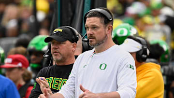 Oct 11, 2025; Eugene, Oregon, USA; Oregon Ducks head coach Dan Lanning instructs his team from the sideline against the Indiana Hoosiers during the third quarter at Autzen Stadium. 