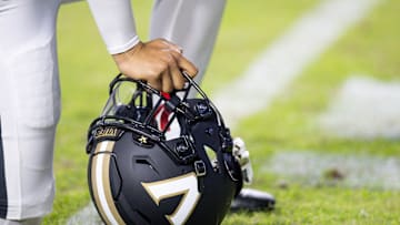 Nov 23, 2024; Baton Rouge, Louisiana, USA;  Detailed view of the Vanderbilt Commodores helmet on the turf against the LSU Tigers during the first half at Tiger Stadium. Mandatory Credit: Stephen Lew-Imagn Images