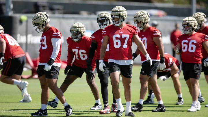 Jul 26, 2024; Santa Clara, CA, USA; San Francisco 49ers offensive linemen perform blocking drills during Day 4 of training camp at SAP Performance Facility. Mandatory Credit: D. Ross Cameron-USA TODAY Sports