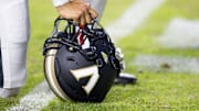 Nov 23, 2024; Baton Rouge, Louisiana, USA;  Detailed view of the Vanderbilt Commodores helmet on the turf against the LSU Tigers during the first half at Tiger Stadium. Mandatory Credit: Stephen Lew-Imagn Images