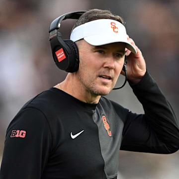 Sep 13, 2025; West Lafayette, Indiana, USA; Southern California Trojans head coach Lincoln Riley stands on the sidelines during the first quarter against the Purdue Boilermakers at Ross-Ade Stadium. Mandatory Credit: Marc Lebryk-Imagn Images