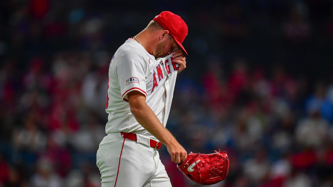 Jul 30, 2025; Anaheim, California, USA; Los Angeles Angels pitcher Reid Detmers (48) walks to the dugout after being relieved against the Texas Rangers during the eighth inning at Angel Stadium. Mandatory Credit: Gary A. Vasquez-Imagn Images
