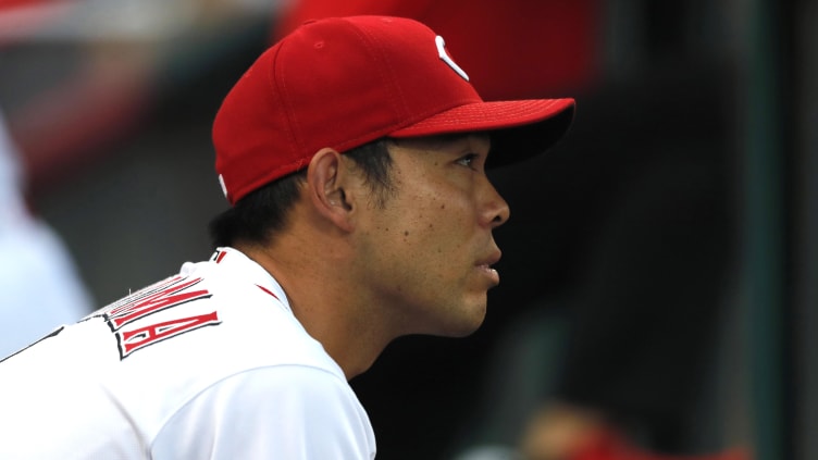 Cincinnati Reds outfielder Shogo Akiyama (4) watches from the dugout.