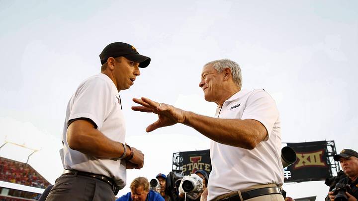 Iowa head football coach Kirk Ferentz, right, meets with Iowa State head football coach Matt Campbell prior to kickoff on Saturday, Sept. 14, 2019, at Jack Trice Stadium in Ames.

20190914 Cyhawkfootball