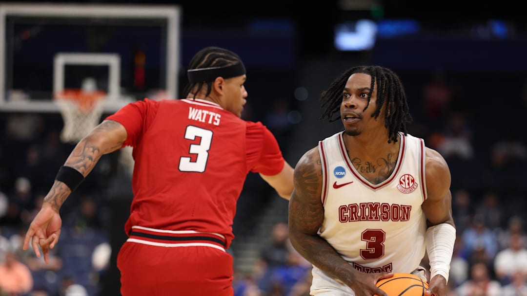 Mar 22, 2026; Tampa, FL, USA; Alabama Crimson Tide guard Latrell Wrightsell Jr. (3) lines up a shot against Texas Tech Red Raiders forward Lejuan Watts (3) in the second half during a second round game of the men's 2026 NCAA Tournament at Benchmark International Arena. Mandatory Credit: Nathan Ray Seebeck-Imagn Images