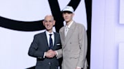 Jun 25, 2025; Brooklyn, NY, USA;  Egor Demin stands with NBA commissioner Adam Silver after being selected as the eighth pick by the Brooklyn Nets in the first round of the 2025 NBA Draft at Barclays Center. Mandatory Credit: Brad Penner-Imagn Images